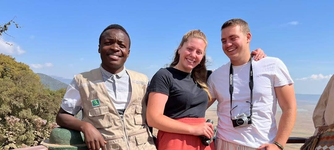 Wild Gaze safari guides with guests overlooking the Tanzanian savanna